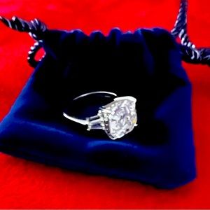Sterling silver with cubic zirconia princess cut stones